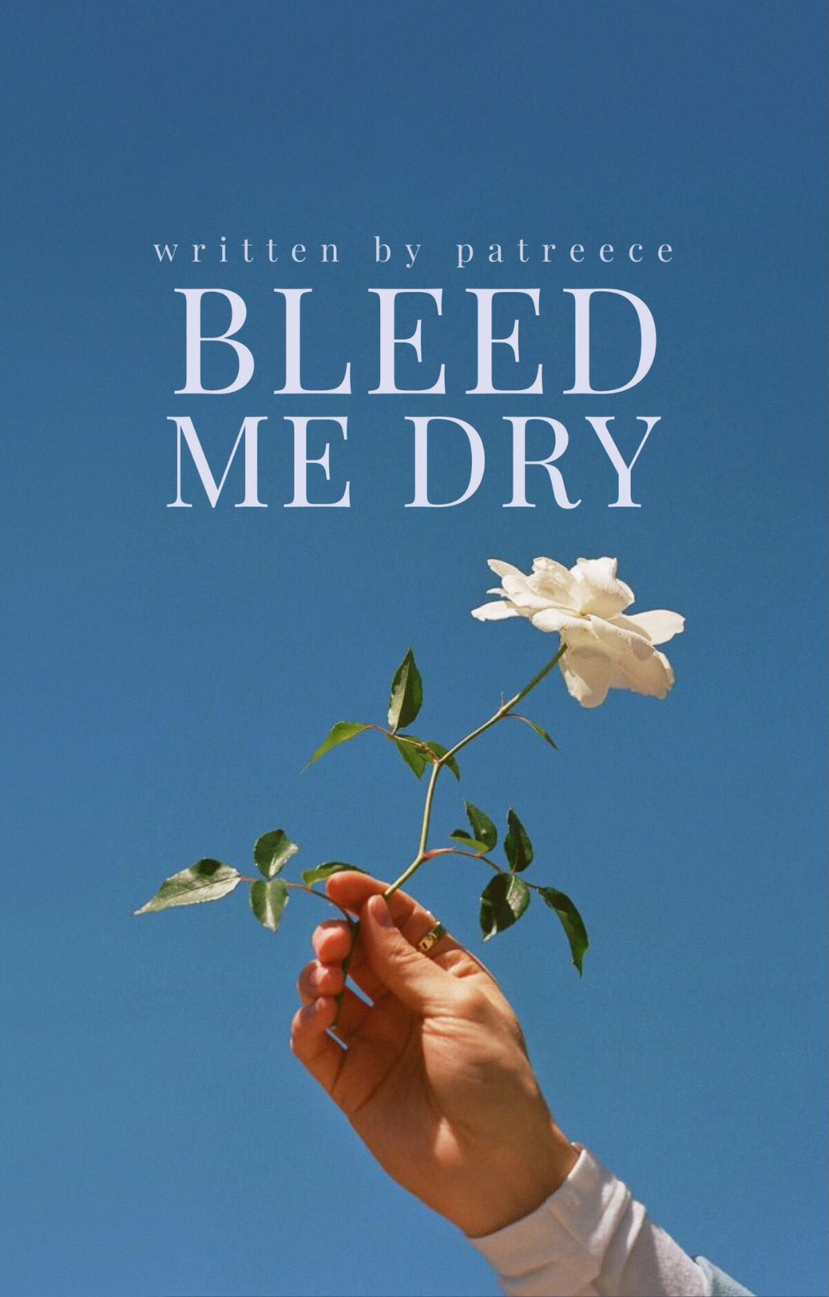a pale hand holding a white rose to the sky. the background is entirely blue sky.